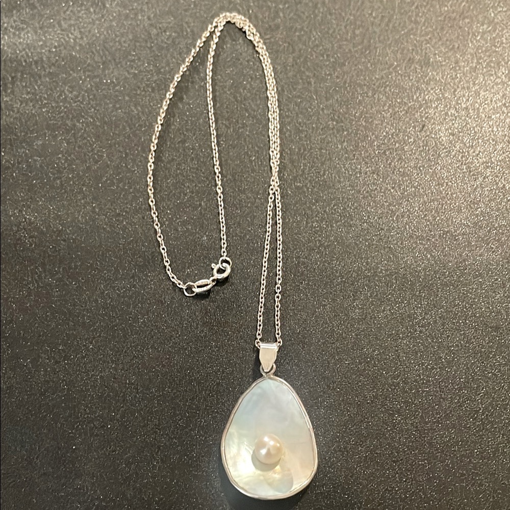 Vintage Antique pearl shell pendant with sterling necklace